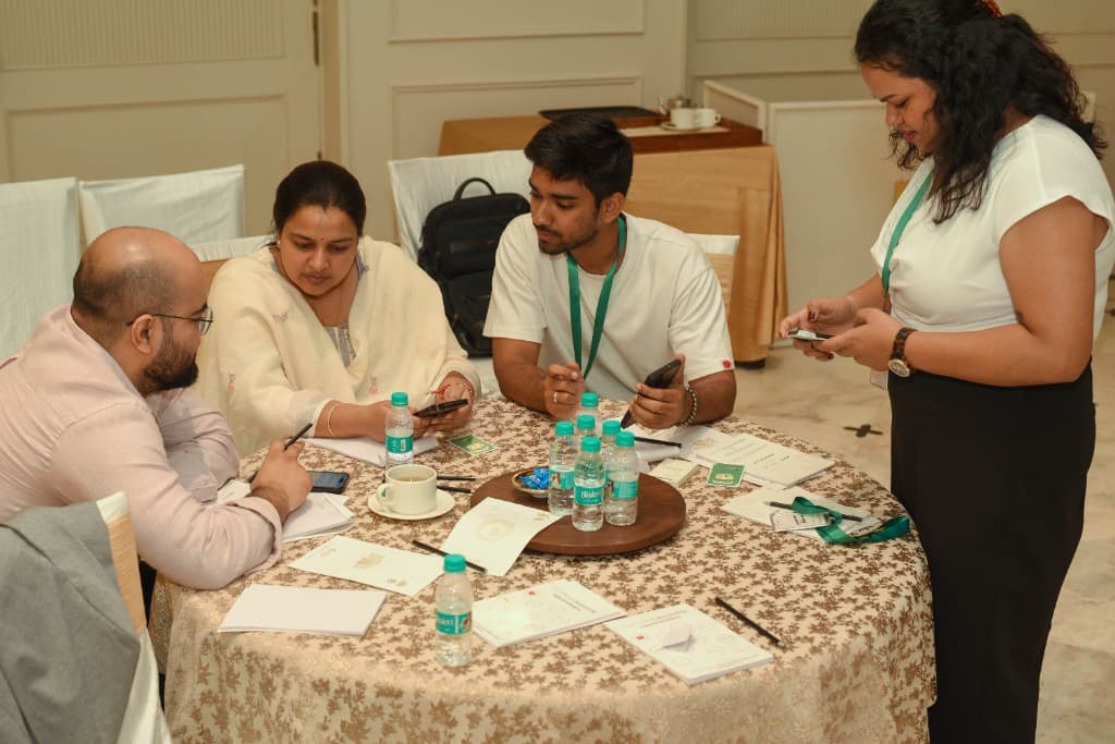 Attendees discussing prompts and notes in the workshop